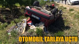 OTOMOBİL TARLAYA UÇTU