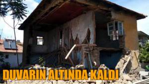 DUVARIN ALTINDA KALDI