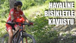 HAYALİNE BİSİKLETLE KAVUŞTU