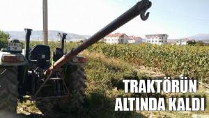 TRAKTÖRÜN ALTINDA KALDI