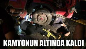 KAMYONUN ALTINDA KALDI