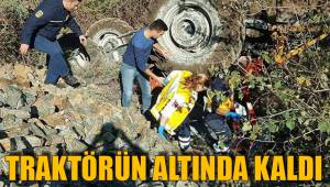 TRAKTÖRÜN ALTINDA KALDI