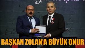 BAŞKAN ZOLAN’A BÜYÜK ONUR