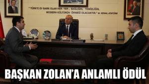 BAŞKAN ZOLAN’A ANLAMLI ÖDÜL