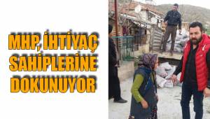 MHP, İHTİYAÇ SAHİPLERİNE DOKUNUYOR