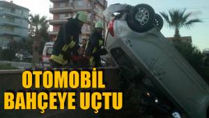 OTOMOBİL BAHÇEYE UÇTU