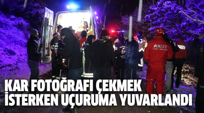 KAR FOTOĞRAFI ÇEKMEK İSTERKEN UÇURUMA YUVARLANDI