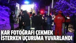 KAR FOTOĞRAFI ÇEKMEK İSTERKEN UÇURUMA YUVARLANDI