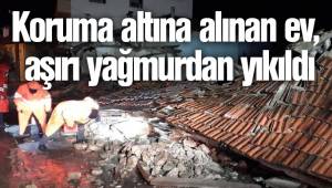 Koruma altına alınan ev, aşırı yağmurdan yıkıldı