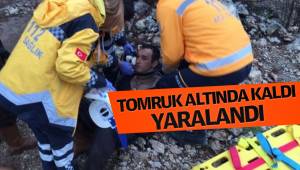 TOMRUK ALTINDA KALDI, YARALANDI
