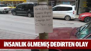 Yolda bulduğu paranın sahibini ağaca astığı ilanla arıyor