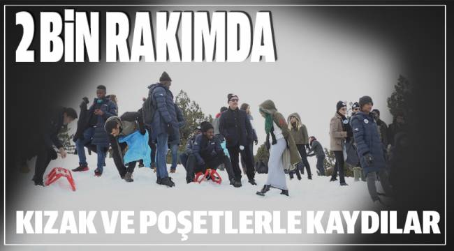 2 bin rakımda kızak ve poşetlerle kaydılar