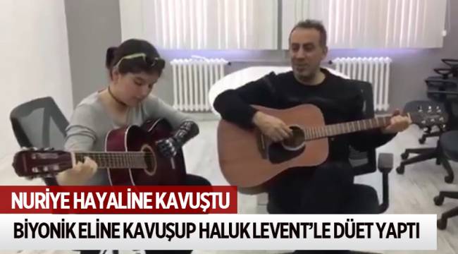 BİYONİK ELİNE KAVUŞUP HALUK LEVENT'LE DÜET YAPTI