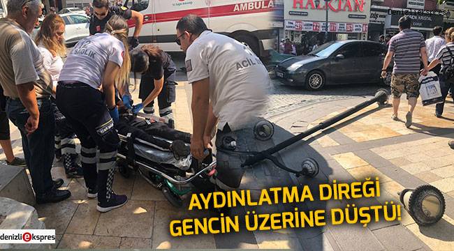 Aydınlatma direği gencin üzerine düştü!