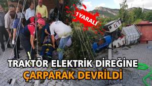 Traktör elektrik direğine çarparak devrildi