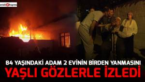Yaşlı adam yanan evini gözyaşları içinde izledi.