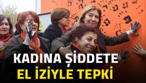 Denizli'de kadına şiddete el iziyle tepki