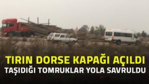 Seyir halindeki otomobil tomrukların üzerine çıkarak asılı kaldı