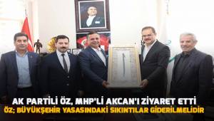 AK Partili Öz, MHP'li Akcan'ı ziyaret etti