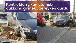Kontrolden çıkan otomobil dükkana girmek üzereyken son anda durdu