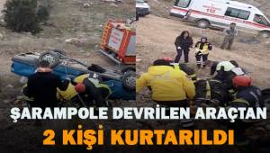 Şarampole devrilen araçtan 2 kişi kurtarıldı