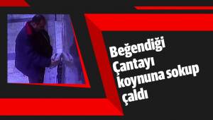 Beğendiği çantayı koynuna sokup çaldı