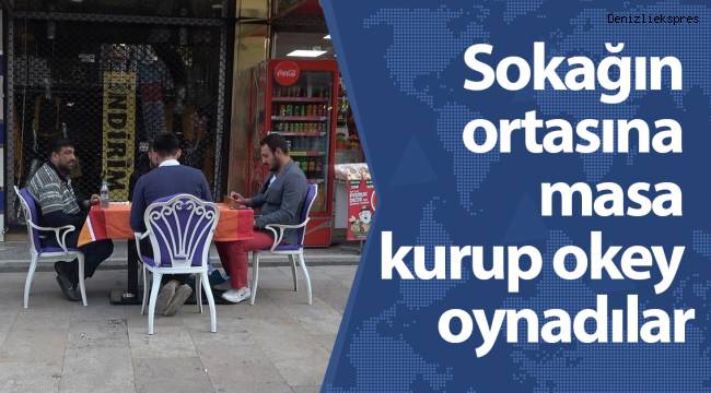 Sokağın ortasına masa kurup okey oynadılar