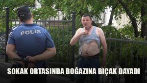Sokak ortasında kendi boğazına bıçak dayadı