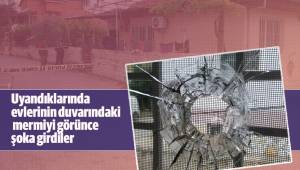 Uyandıklarında evlerinin duvarındaki mermiyi görünce şoka girdiler
