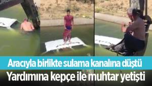 Aracıyla birlikte sulama kanalına düştü, yardımına kepçe ile muhtar yetişti