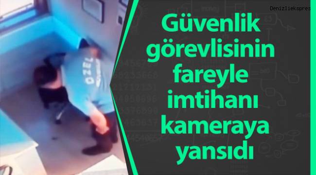 Güvenlik görevlisinin fareyle imtihanı kameraya yansıdı