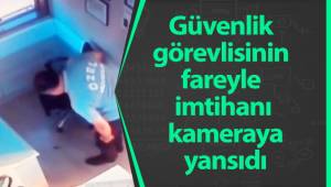 Güvenlik görevlisinin fareyle imtihanı kameraya yansıdı