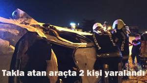 Takla atan otomobilde iki kişi yaralandı