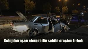 Refüjden aşan otomobilin sürücüsü araçtan fırladı