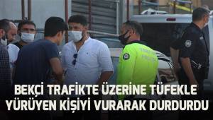 Bekçi, trafikte üzerine tüfekle yürüyen kişiyi vurarak durdurdu