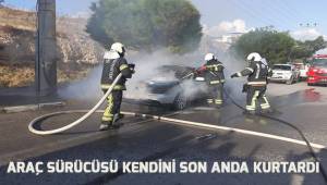 Otomobilden çıkan dumanlar yerini alevlere teslim etti