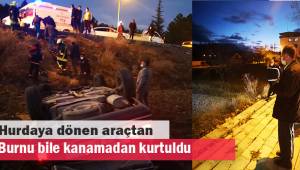 Hurdaya dönen araçtan burnu bile kanamadan kurtuldu