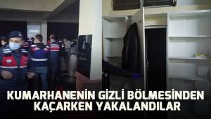 Kumarhanenin gizli bölmesinden kaçarken yakalandılar
