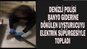Polis banyo giderine dökülen uyuşturucuyu elektrikli süpürgeyle topladı