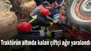 Traktörün altında kalan çiftçi ağır yaralandı