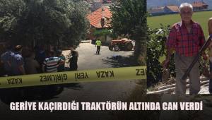 Geriye kaçırdığı traktörün altında can verdi
