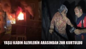 Binayı saran alevler arasında kalan yaşlı kadın dakikalar sonra kurtarıldı