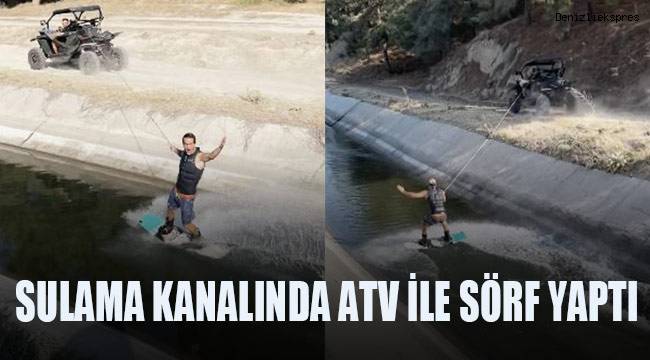 Sulama kanalında ATV ile sörf yaptı
