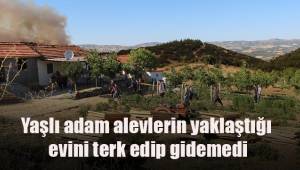 Yaşlı adam alevlerin yaklaştığı evini terk edip gidemedi