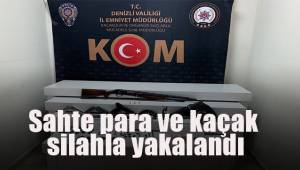 Sahte para ve kaçak silahla yakalandı