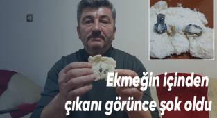 Yemek için böldüğü ekmeğin içinde 2 santimlik vida çıktı