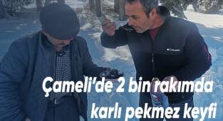 Kar yağışının ardından yaylada karlı pekmez yediler
