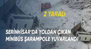 Karda yoldan çıkan yolcu minibüsü şarampole yuvarlandı: 2 yaralı
