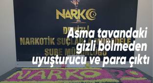Asma tavandaki gizli bölmeden uyuşturucu ve para çıktı