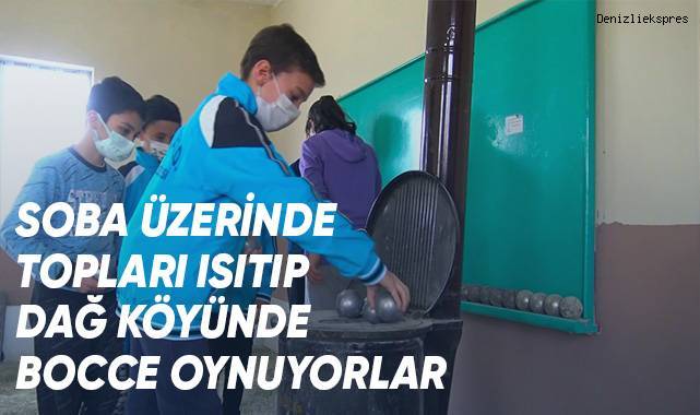 Soba üzerinde topları ısıtıp dağ köyünde bocce oynuyorlar
